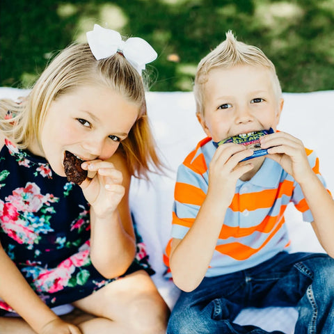 Children Eating Rule Breaker Snacks