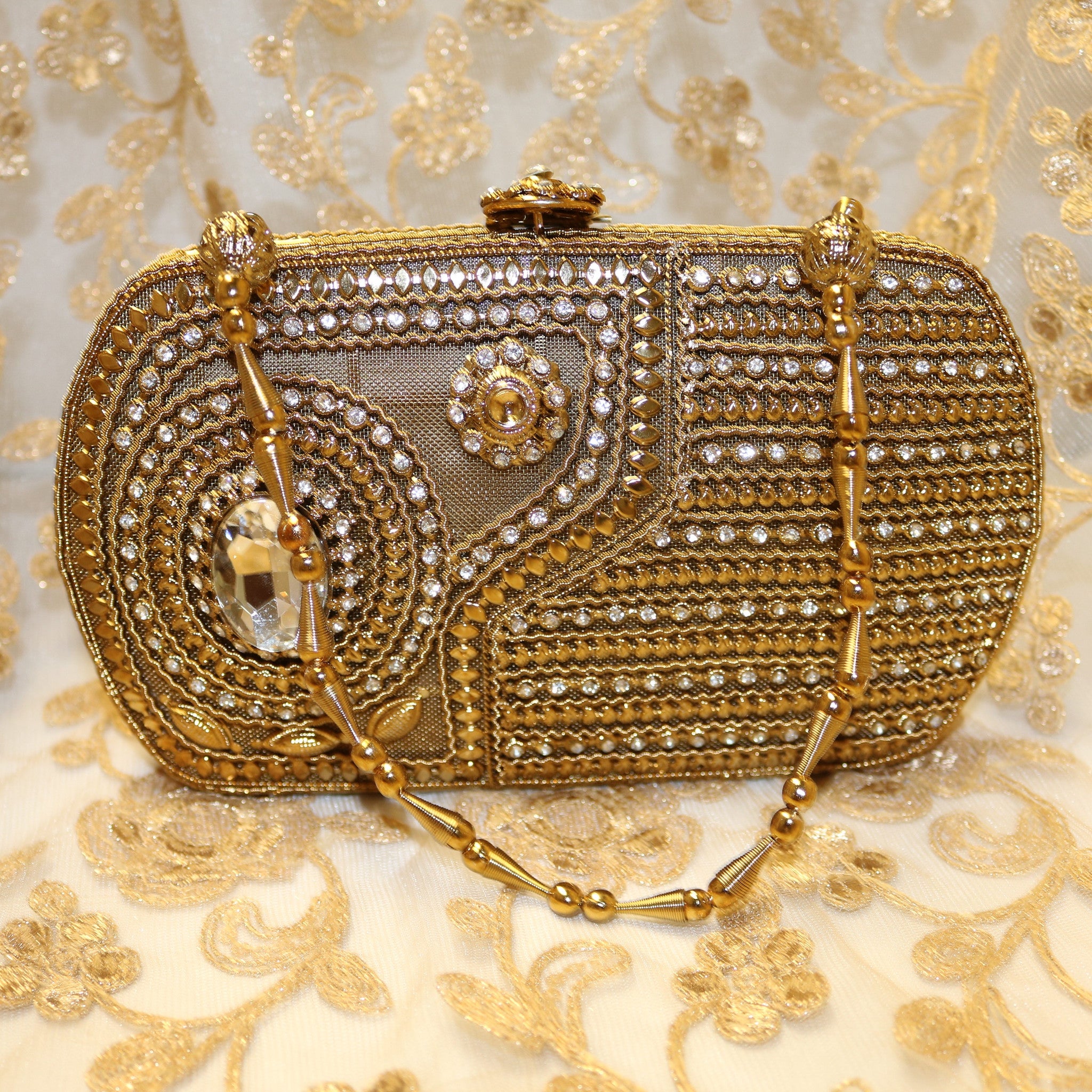 gold diamond clutch