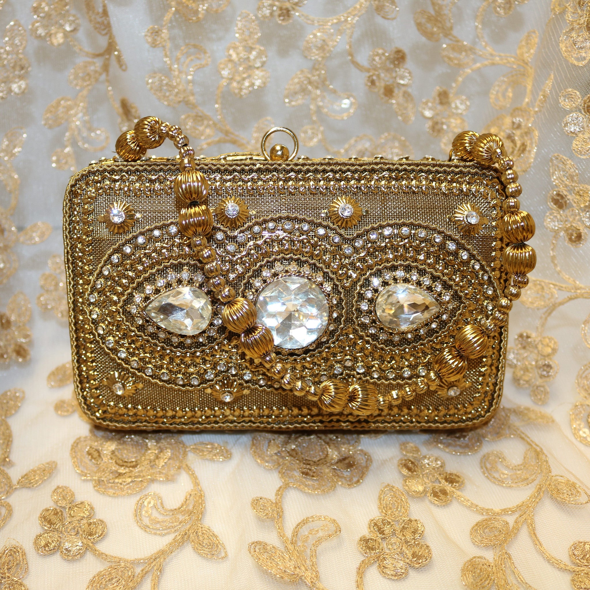 gold diamond clutch