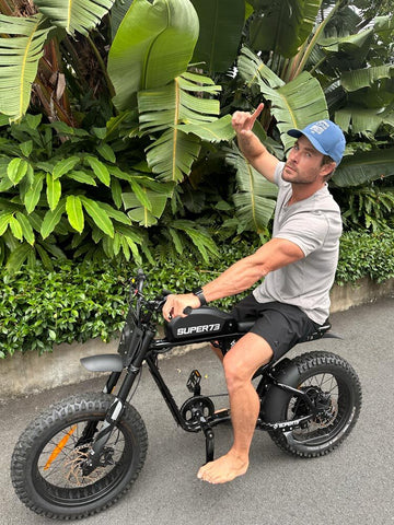 Photo of Chris Hemsworth on his SUPER73-S2 ebike.