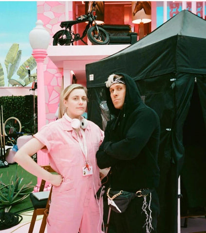 Image of Greta Gerwig and Ryan Gosling on the Barbie set with a SUPER73-S2 ebike in the background.
