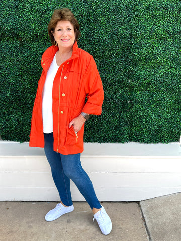 susan the owner of tres chic boutique in houston texas wearing ciao milano rain coat