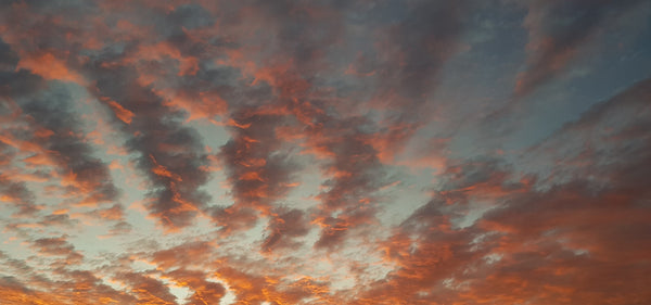 Clouds at sunset used for Sea to Summit Banner image