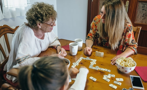mothers day ideas at home, grandmother and mom playing games with child