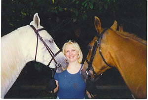 photo of Sandy Taz with horses