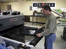 Cure the ink onto the t-shirt using a flash unit or conveyor dryer