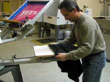 Load a t-shirt onto the platen