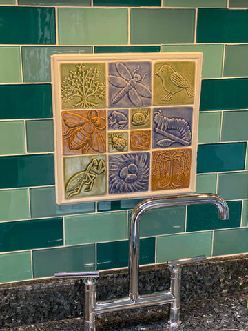 handmade tile behind a kitchen sink
