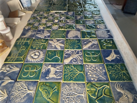 assortment of handmade tiles