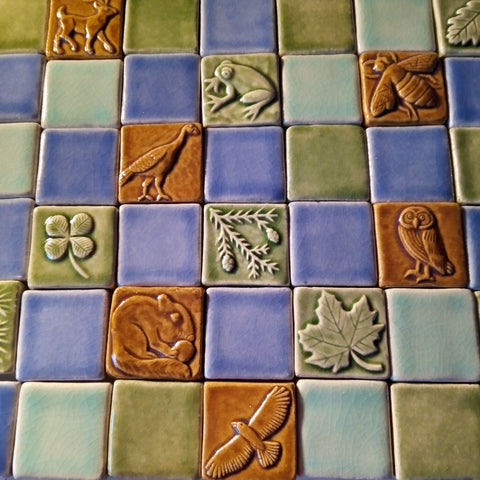 multicolored plant and animal handmade tiles