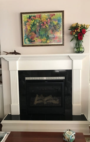 black and white hearth featuring handmade tiles and white wood work