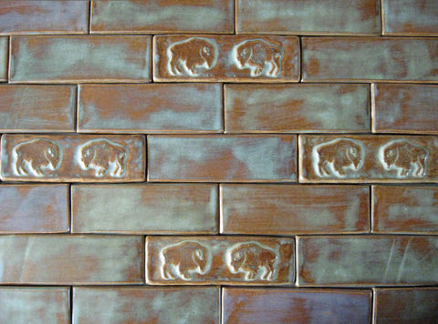 handmade tiles with a buffalo or bison theme