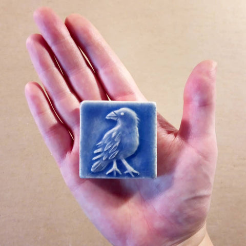 crow handmade tile blue glaze