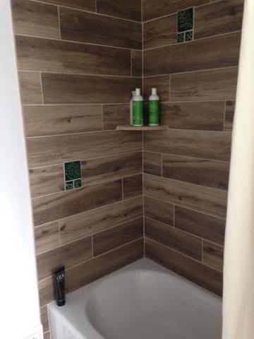 handmade tile shower with wood grain look tiles