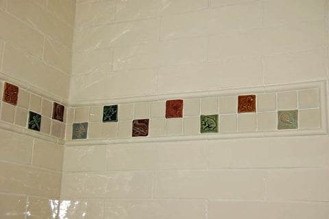 handmade animal tile border for a children's bathroom