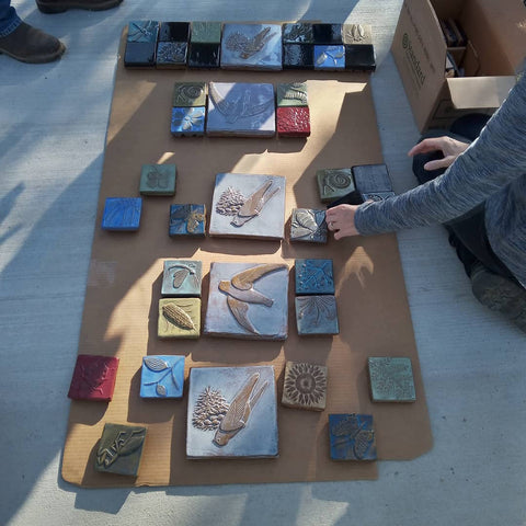 laying out tiles for the chimney swift tower in downtown kent ohio