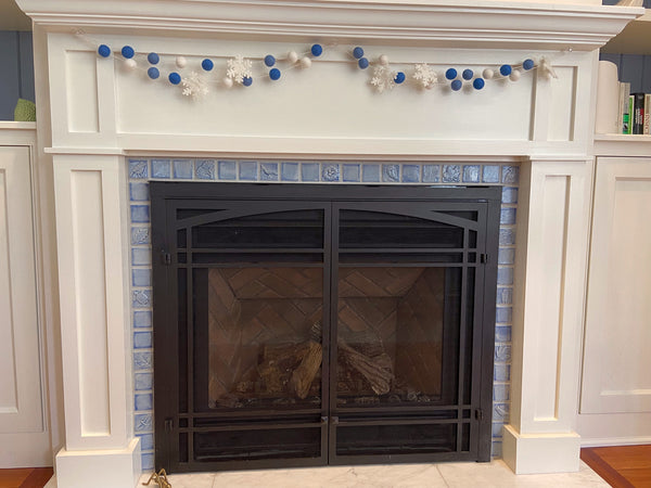 blue and white hearth featuring custom woodwork and handmade tiles