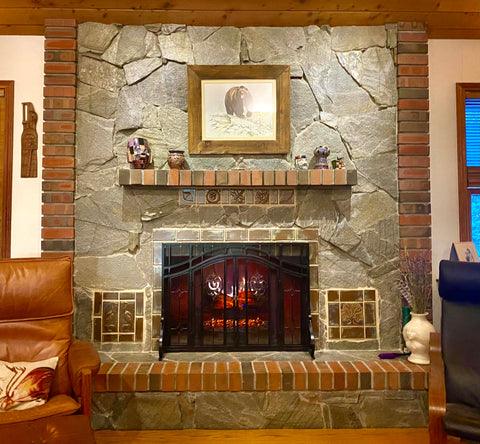 electric fireplace with screen and handmade tile surround