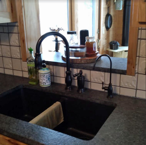  handmade bear tiles installed in a kitchen backsplash