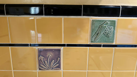 a 1939 vintage tile kitchen which has been slightly modified to include handmade arts and crafts style tiles