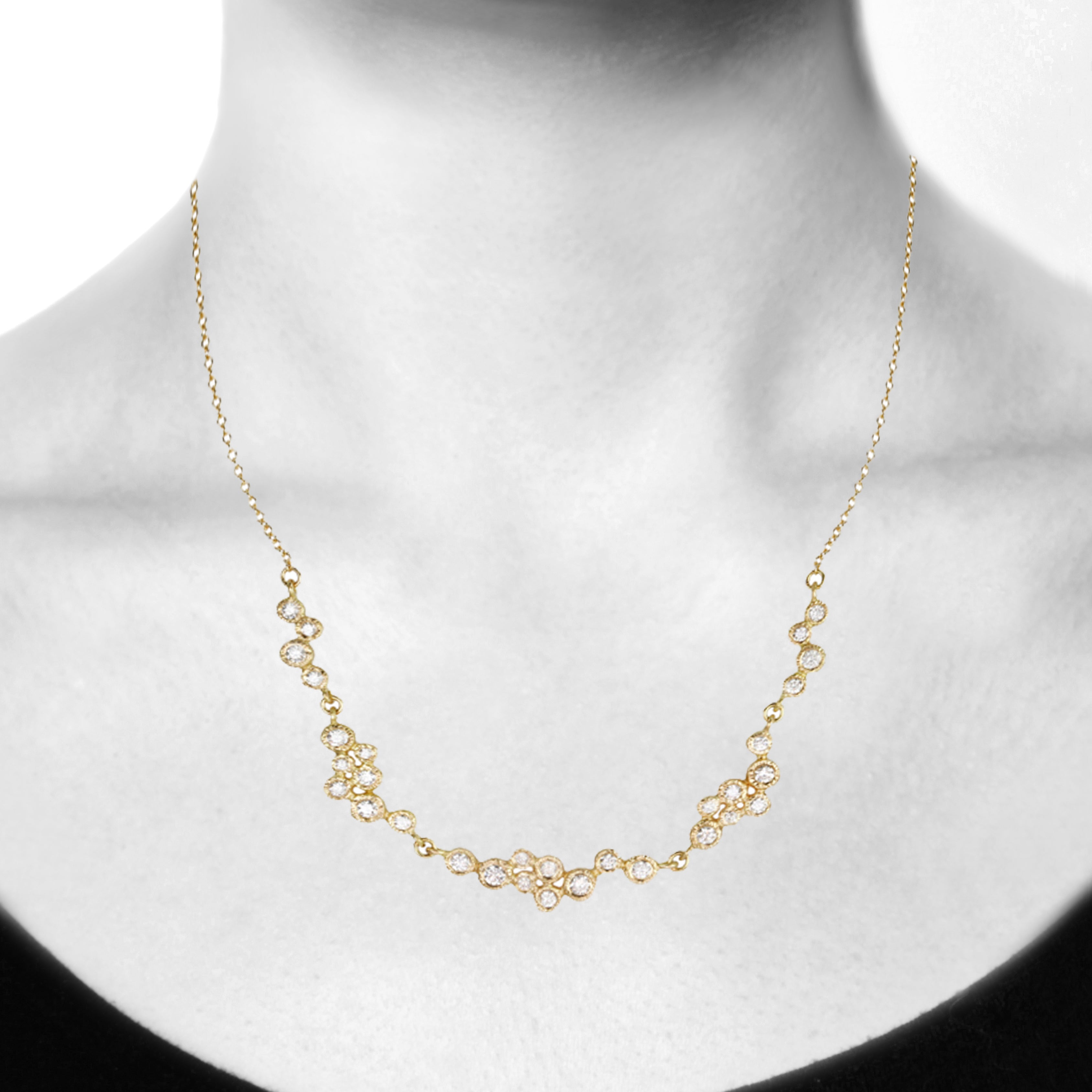 Gold and Bezel-Set Diamond Clusters Necklace