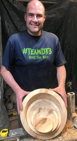 Jed holding the largest bowl blank and the three cores that he took out of the center of it - Dailey Woodworking
