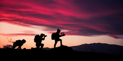 cameramen on a hill