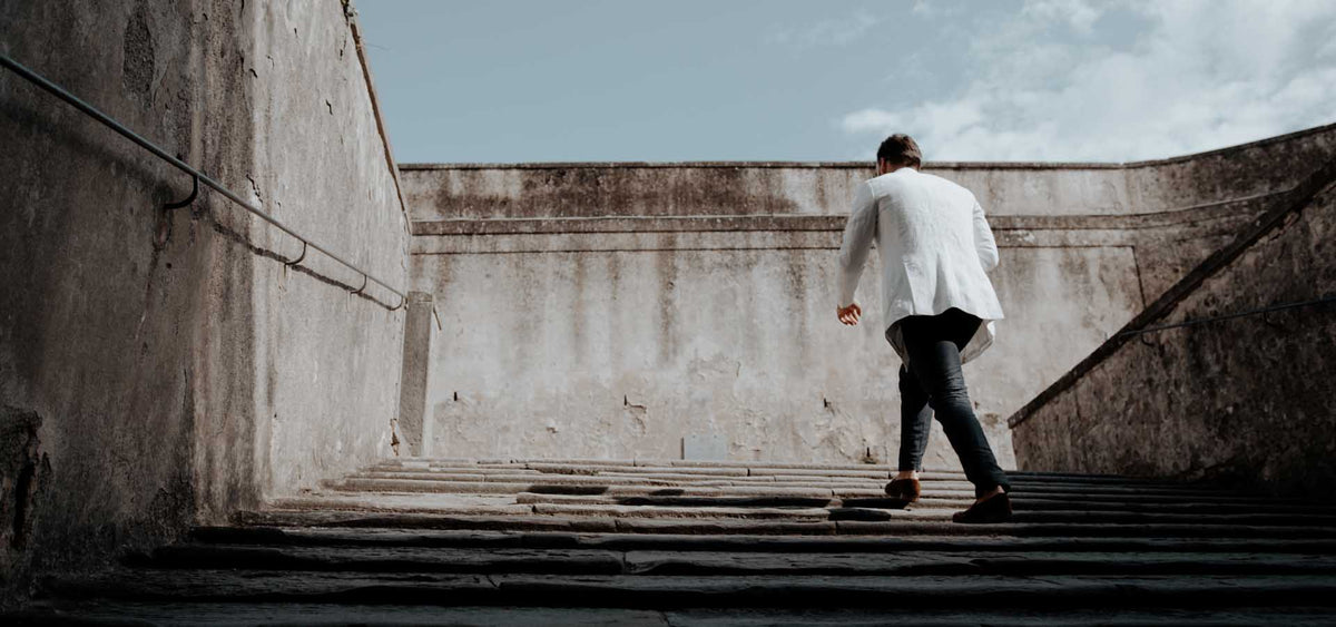 cinematic lut man walking on steps up