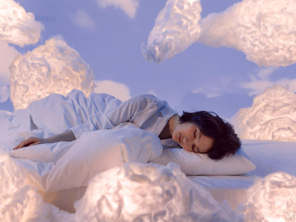 Woman sleeping in the clouds