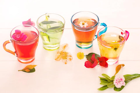 Different colorful flower drinks