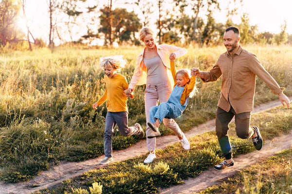 Happy family running