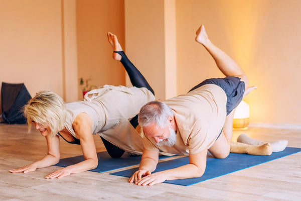 Mature couple exercising