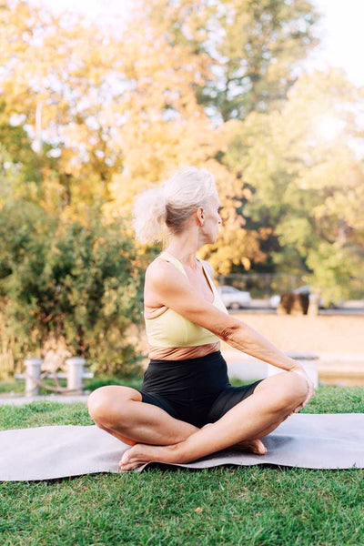 Mature woman exercising yoga