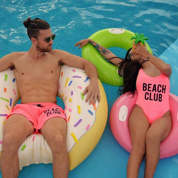 husband and wife matching bathing suits