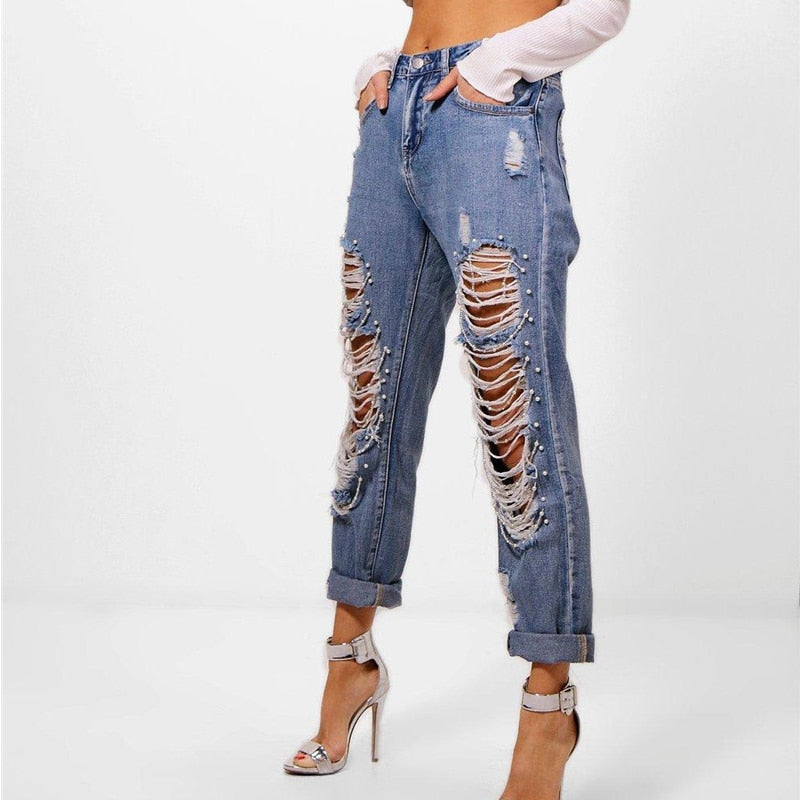 cut up jeans with chains