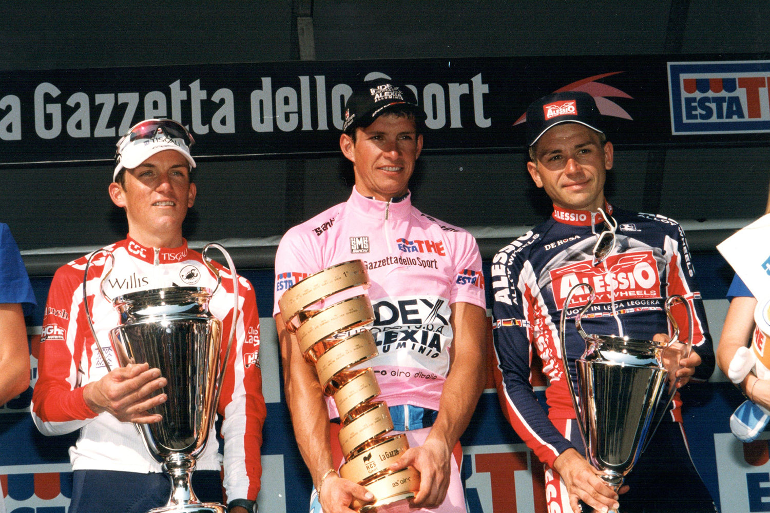 The final podium of the 85th edition of the Giro D'Italia.  1st Paolo Savoldelli (Index - Alexia Alluminio), 2nd Tyler Hamilton (CSC ProTeam - Tiscali), 3rd Pietro Caucchioli (Alessio - Bianchi).