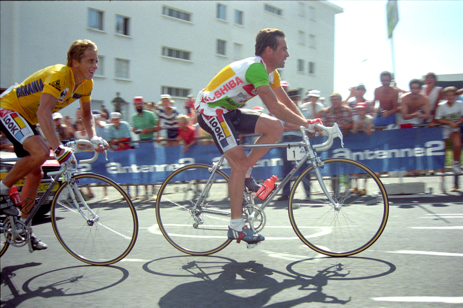 Bernard Hinault (Right, Combination jersey) leads race leader and La Vie Claire team mate Greg Lemond on that famous stage from Briançon to the summit of l'Alpe d'Huez. Photo: Fotoreporter Sirotti.