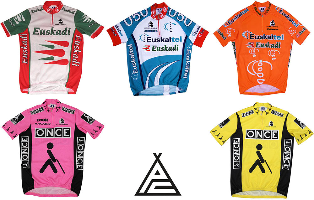 Five jerseys from Etxeondo. The original Euskadi, the Euskaltel/Euskadi, the orange Euskaltel and the pink and yellow ONCE jerseys.