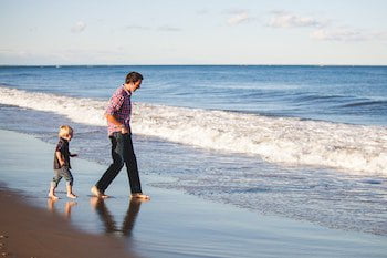 Parent and child at the beach