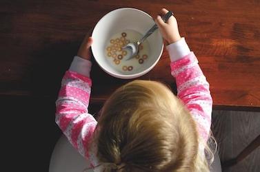 Child eating breakfast