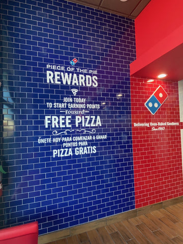 Domino's Rewards Focal Wall Graphic on Blue Subway Tile