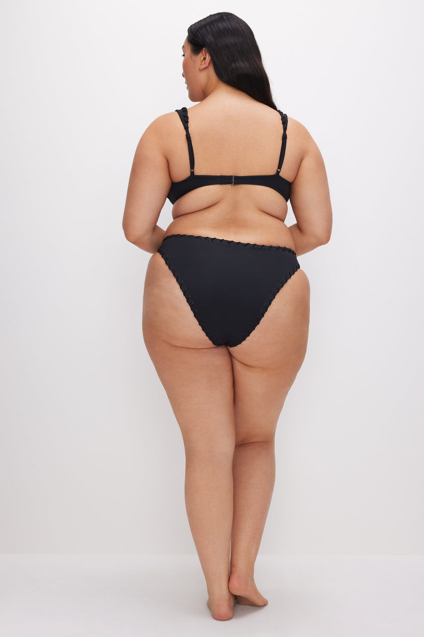 WHIP STITCH COMPRESSION CHEEKY BIKINI BOTTOM | BLACK001 View 9 - model: Size 16 |