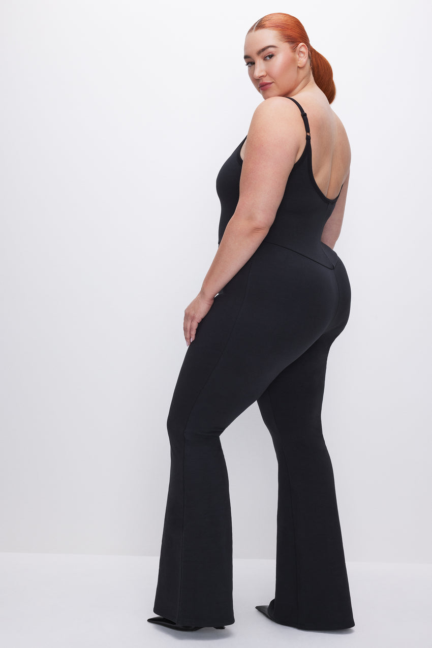 COMPRESSION TERRY SCOOP JUMPSUIT | BLACK001 View 6 - model: Size 16 |