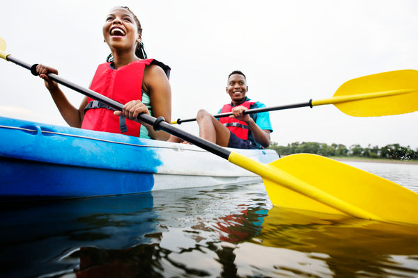 couple canoeing outdoors