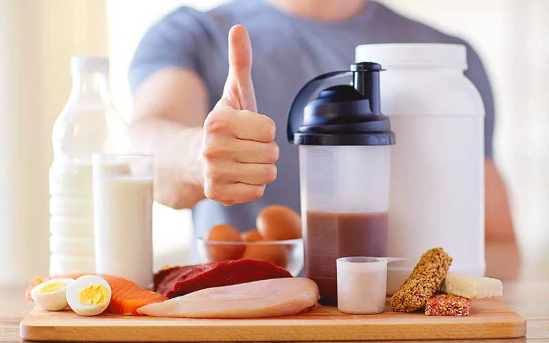 Man eating healthy foods with lean protein and whole grains