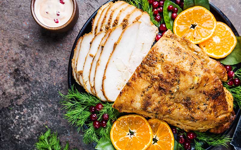 Roasted turkey breast with cranberry and orange.