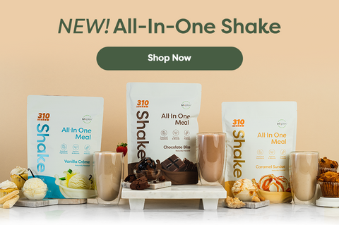 A banner of New 310 All-In-One Shakes in Vanilla Creme, Chocolate Icing, and Caramel Sundae flavors.