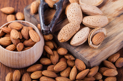 almonds nuts on a wooden table
