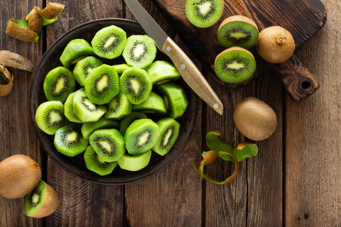 Kiwi fruit on wooden rustic table, ingredient for detox smoothie