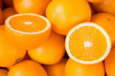 Closeup of sliced oranges on a market